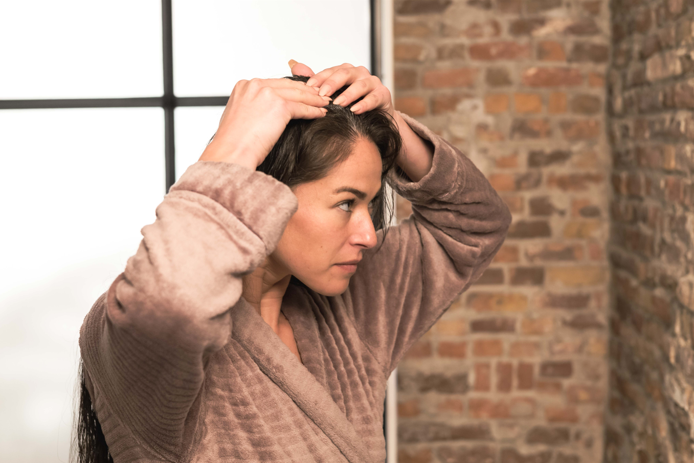 Why does my scalp smell?